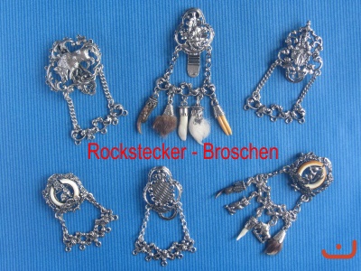 Stecker-Broschen